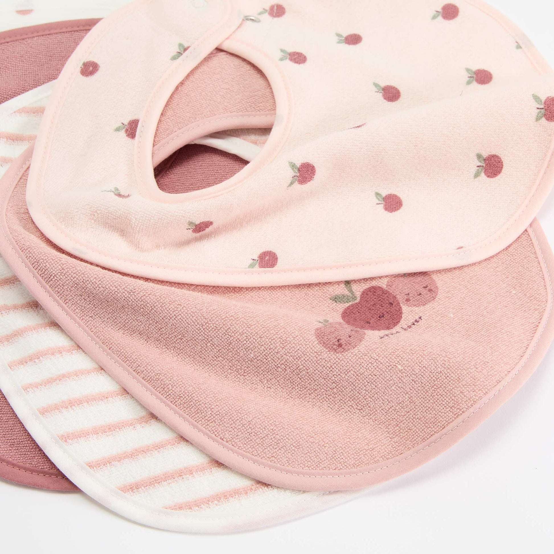Set of 5 bibs with fun prints and snap closures PINK