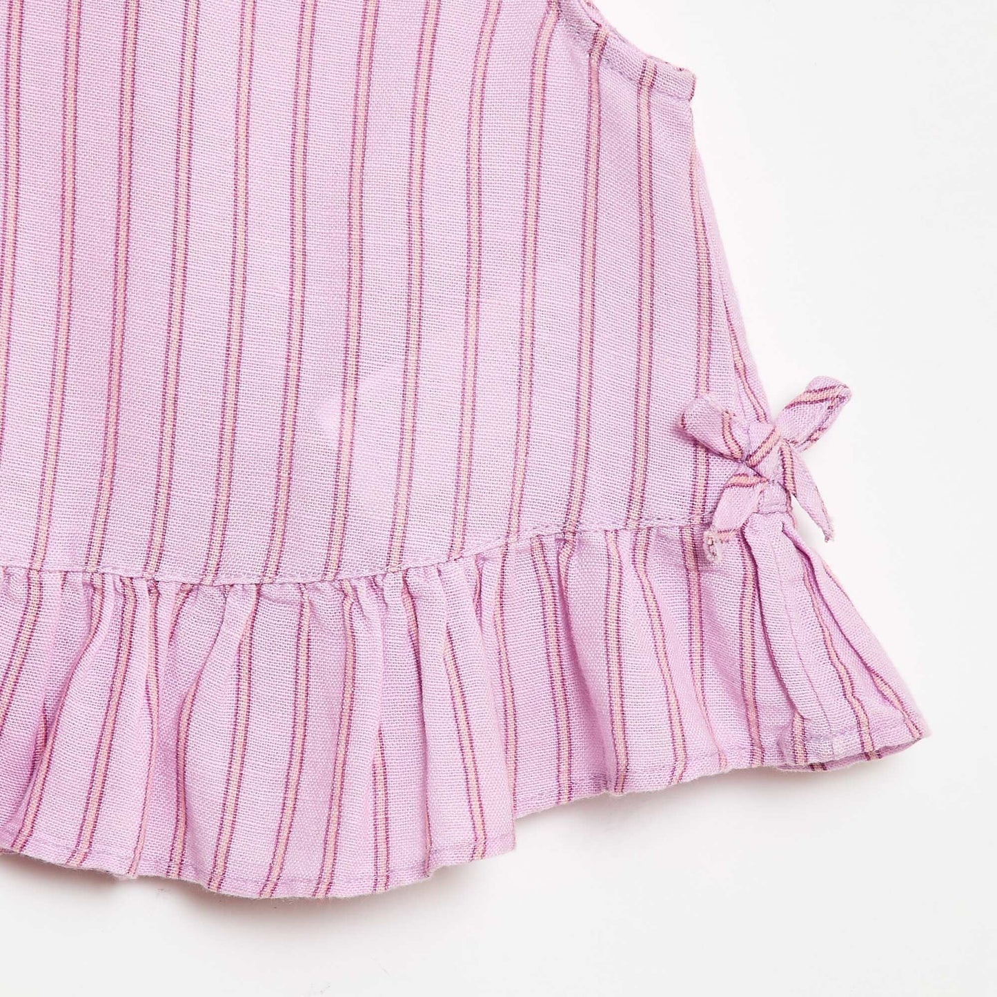 Sleeveless blouse with ruffles and bows PURPLE