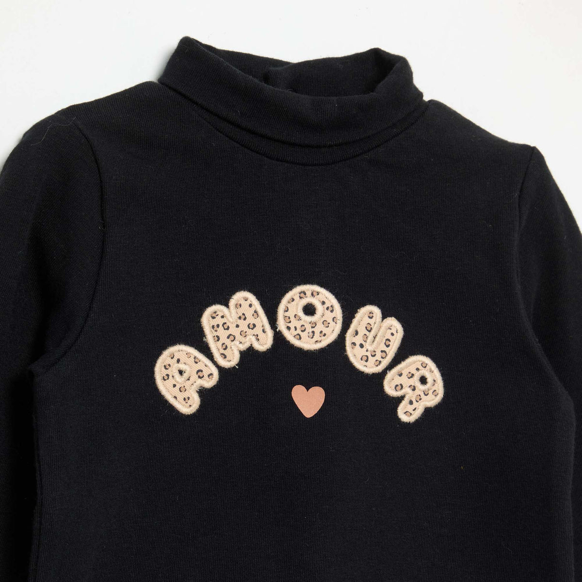 Turtleneck top with playful bow BLACK