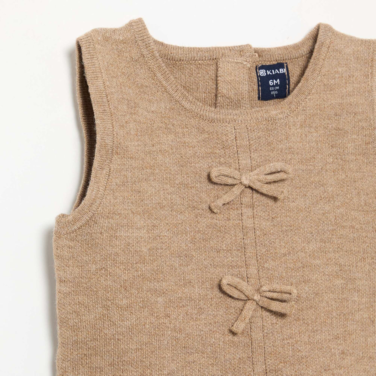 Sleeveless knitted dress with bows BEIGE