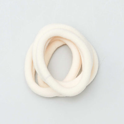 Pack of 10 elasticated hair bands BEIGE